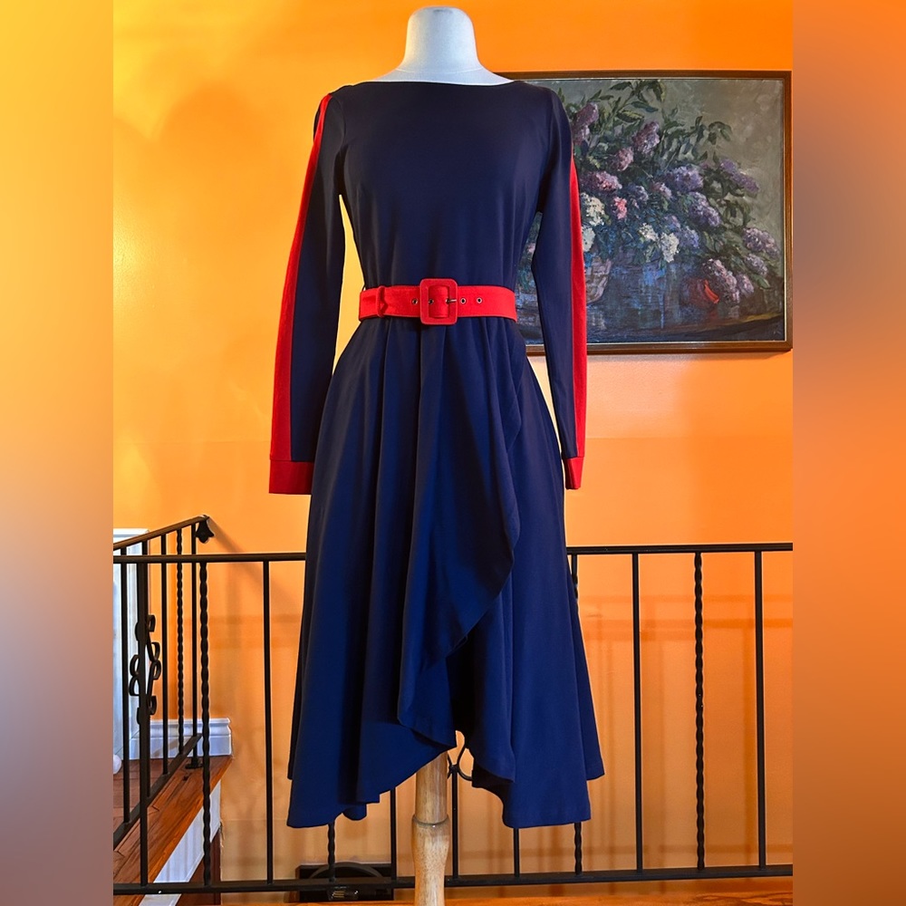 dress by Zapelle. Navy blue with red details. Back zip closure.Size: S